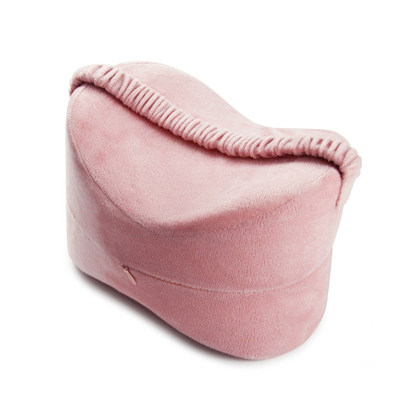 Pink Knee Pillow with its elastic strap on top