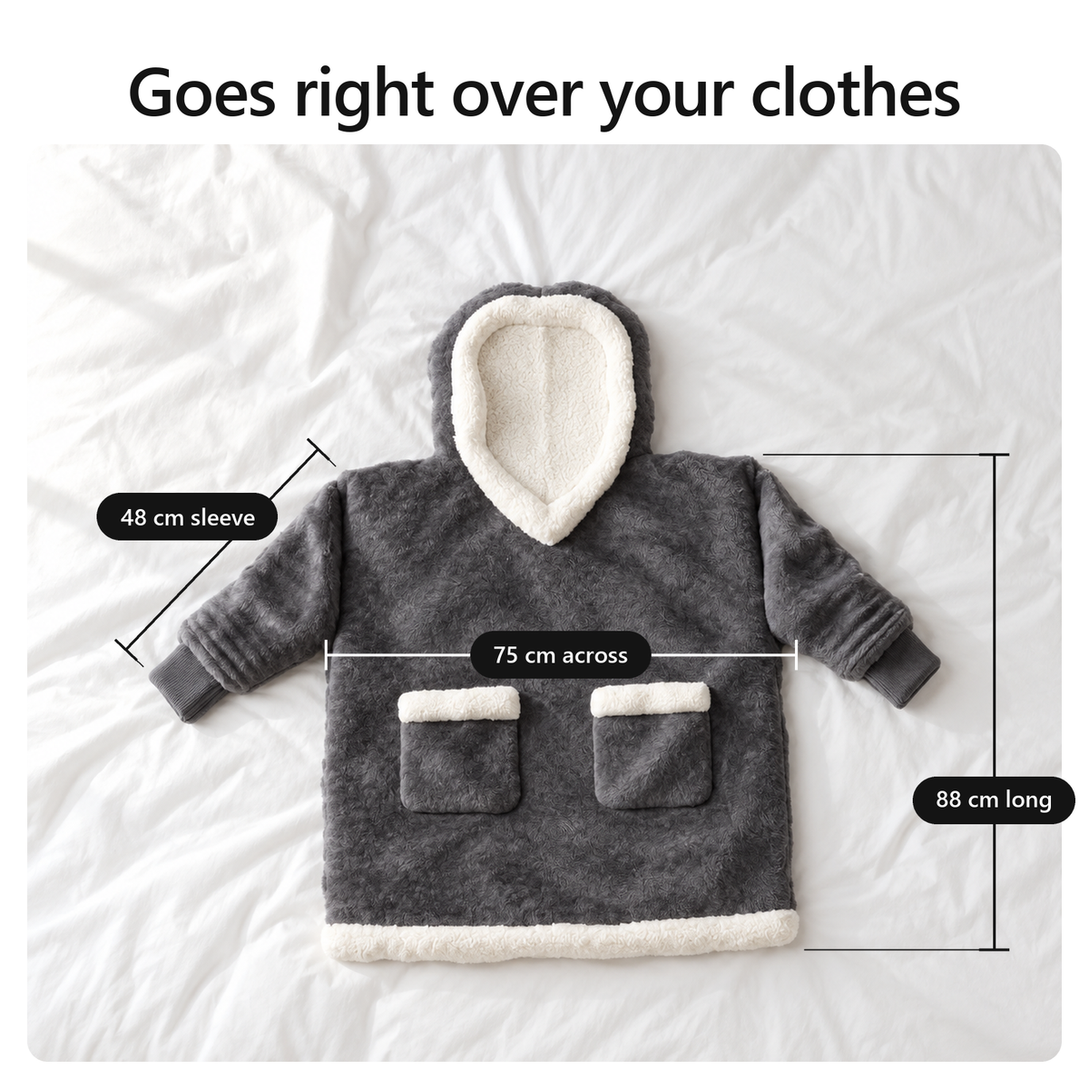 Goes right over your clothes. Laid flat: 88 cm long, 75 cm across, 48 cm sleeve